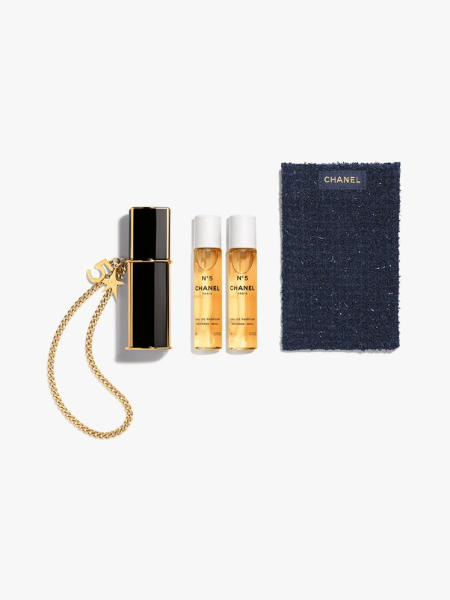 Chanel N°5 Eau de Parfum Purse Spray set on light gray background